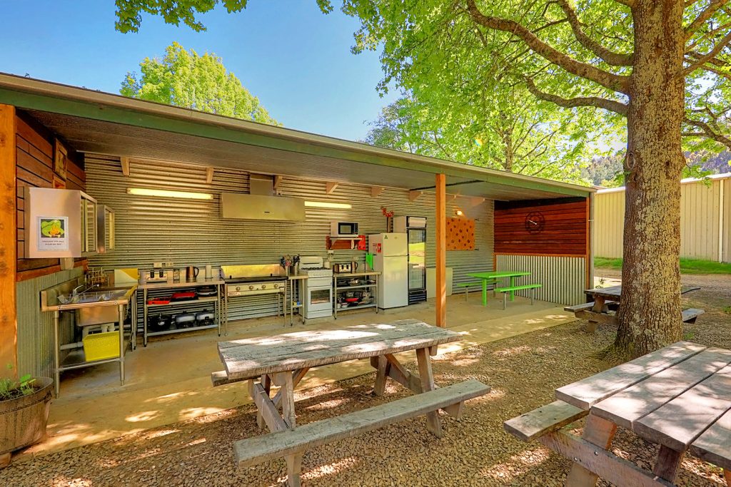 01-bright-valley-holiday-park-camp-kitchen Unpowered caravan and camping site at Bright Valley Holiday Park in Porepunkah, Grassy Area, Plenty of Shade, Camp Kitchen, Great Amenities