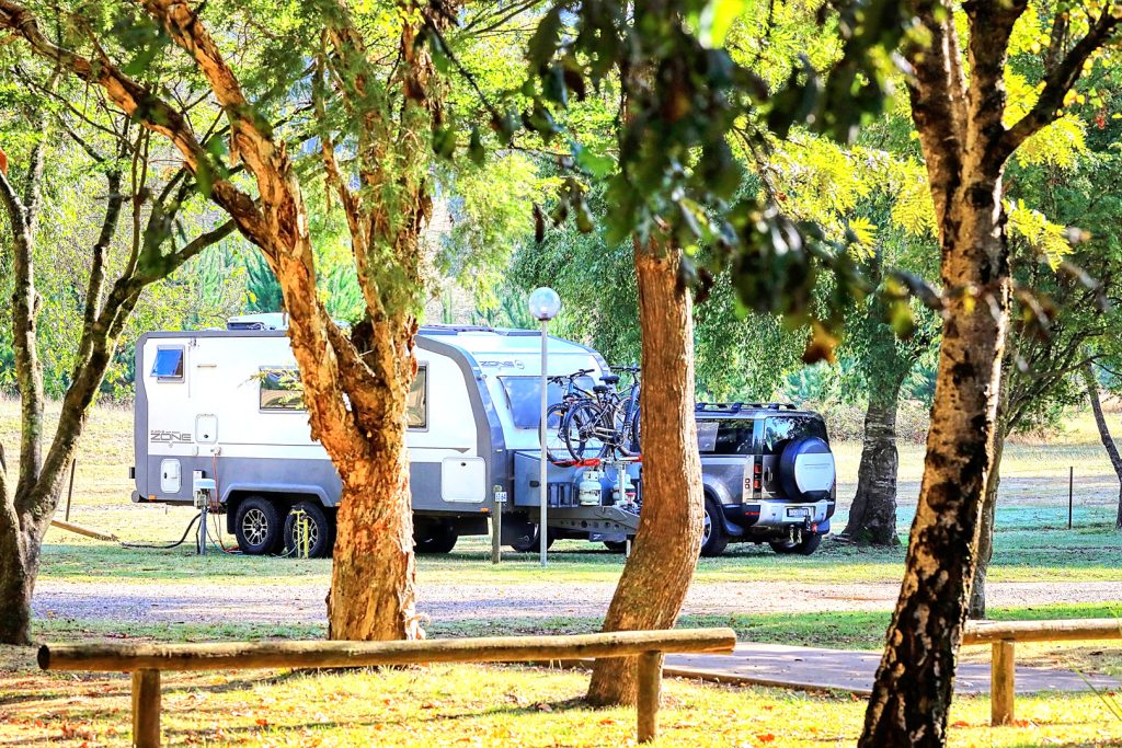 02-bright-valley-holiday-park-powered-site Powered caravan and camping site at Bright Valley Holiday Park in Porepunkah, Grassy Area, Plenty of Shade
